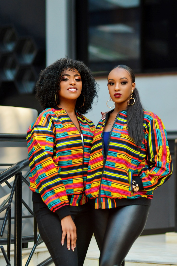 Two people wearing colorful jackets.
