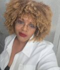 Blonde Curly Afro worn by BeDazzle Hair Sista CEO