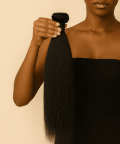 Yaki Straight Virgin Remy Human Hair Bundle held by a woman in black top – natural texture, soft shine.